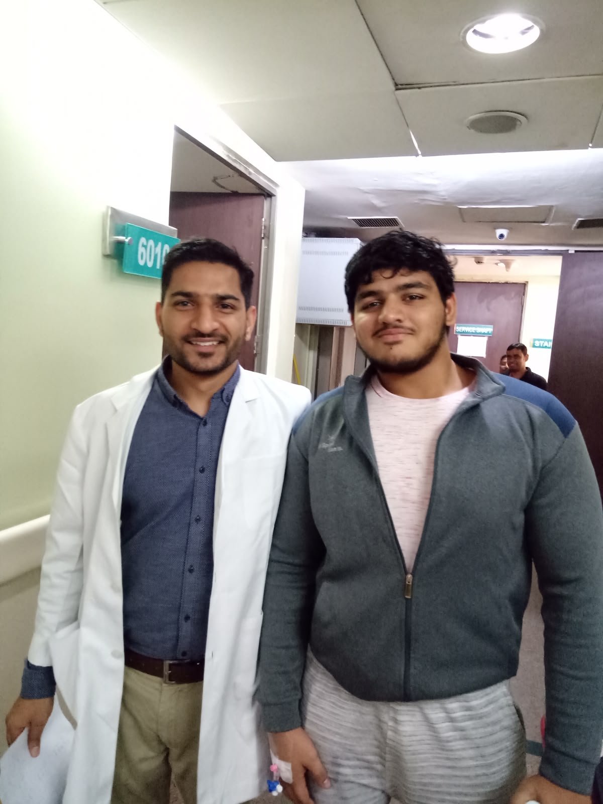 Dr. Sanjeev Kumar with a national-level kushti player.